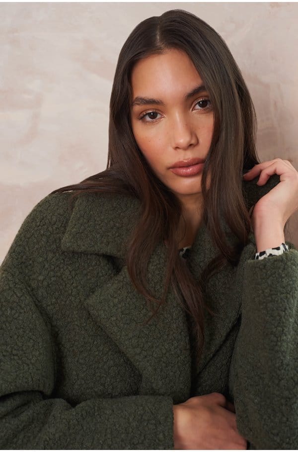 dropped shoulder coat in mossy green