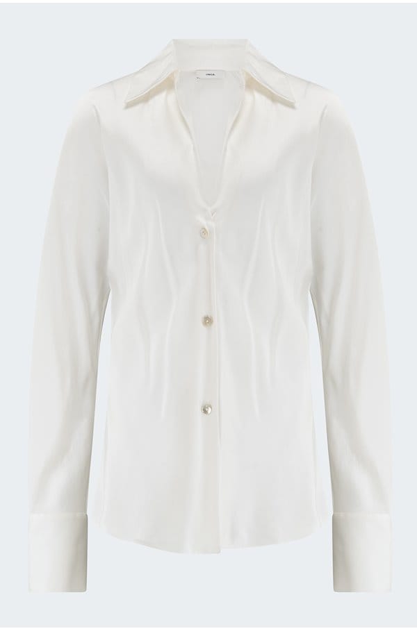 bias long sleeve blouse in off white